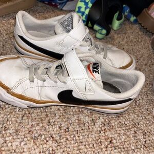 Nike Kids White, Black, and Gold Sneakers